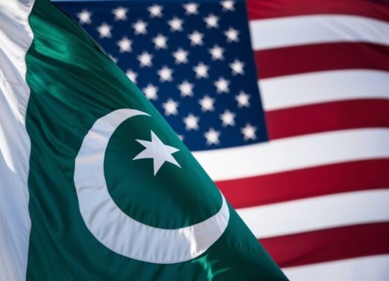The flags of Pakistan and the United States displayed side by side, symbolizing diplomatic relations